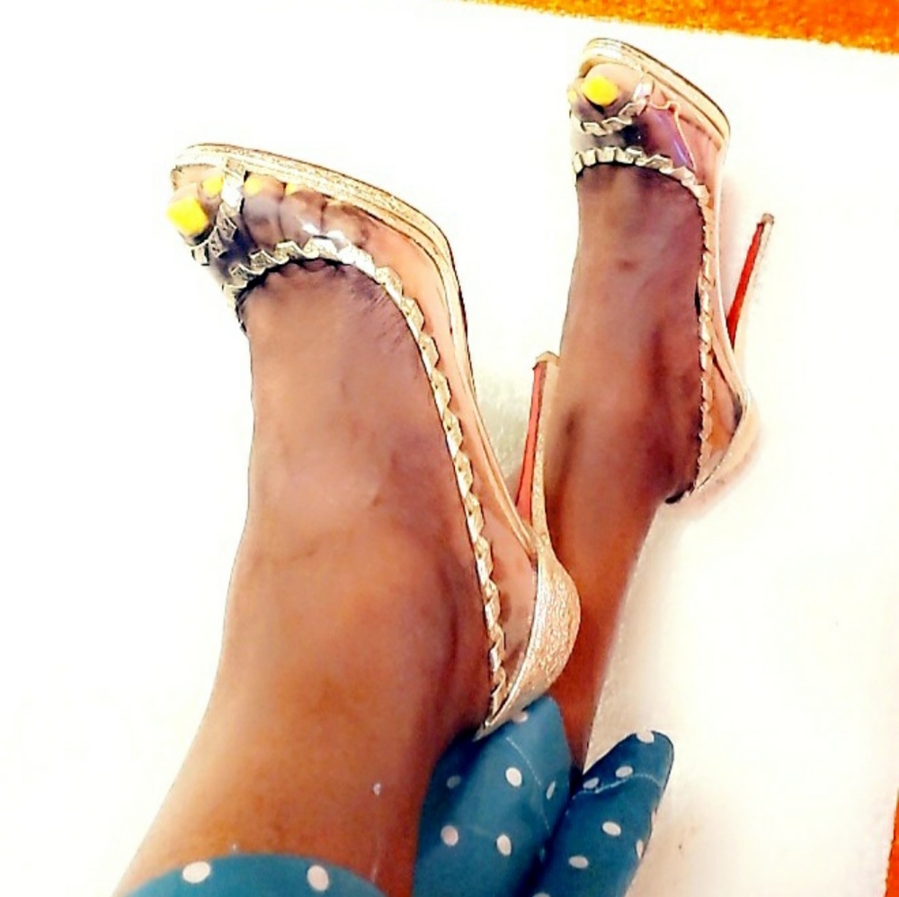 Christian Louboutin peep toe pumps